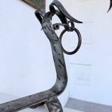 Pair of zoomorphic metal andirons "dogs" 1950