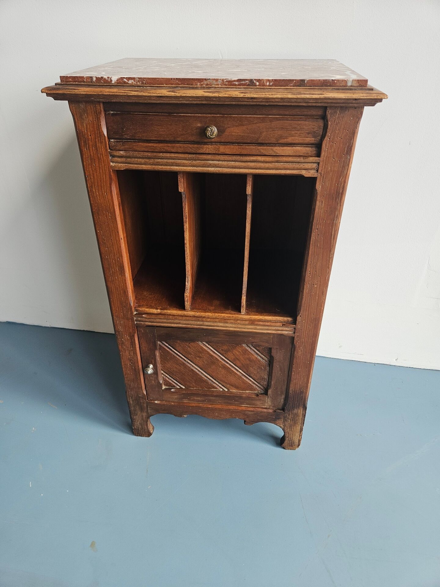 Wooden bedside table with book storage