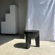 Black mango wood tripod side table with a semi-spherical top, height: 45 cm, diameter: 44 cm.