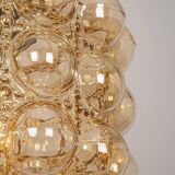 Large amber bubble glass pendant by Helena Tynell for Limburg, Germany, 1970s.