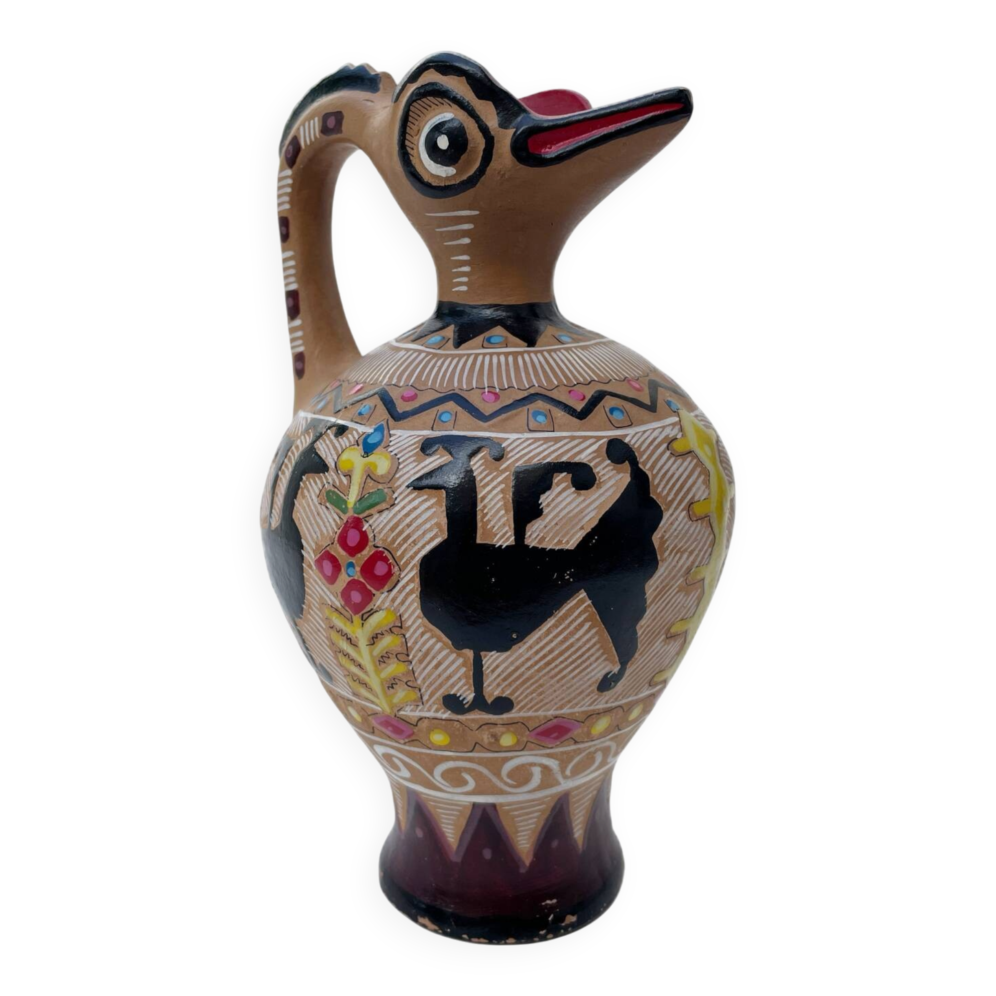 Clay pitcher with a bird head