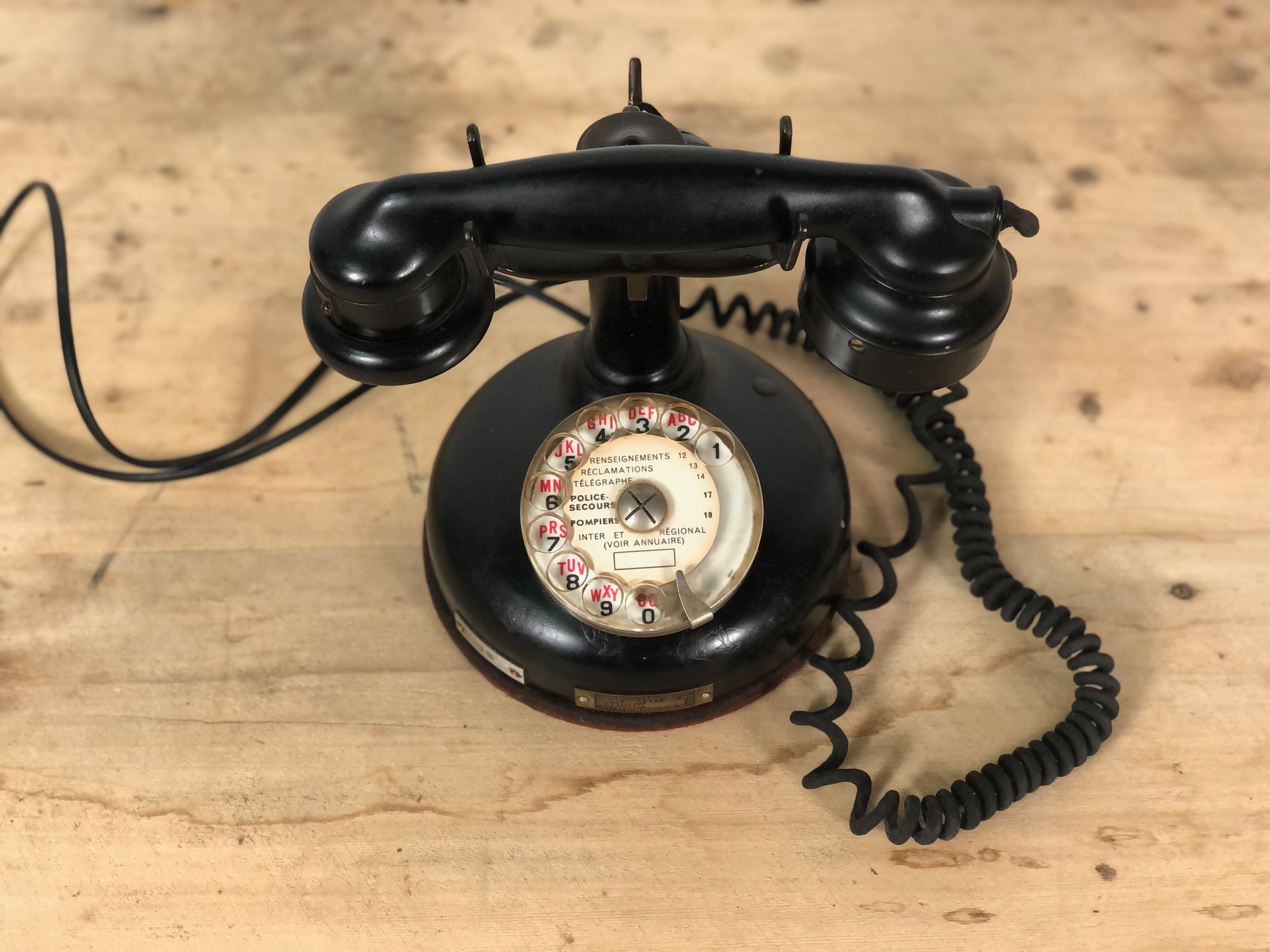 Old column phone in Bakelite and metal 1936