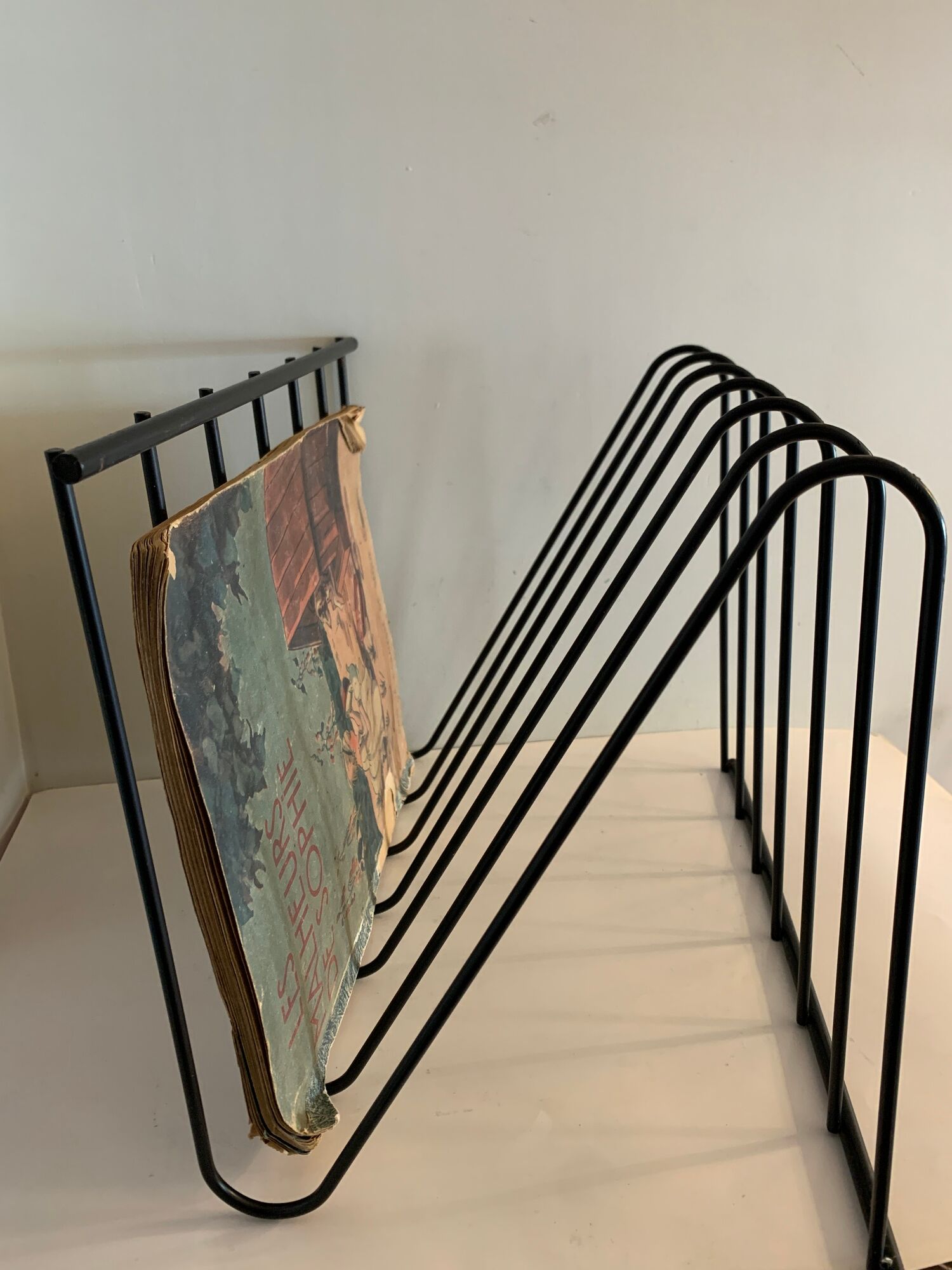 Magazine holder, black metal in Z, 1970