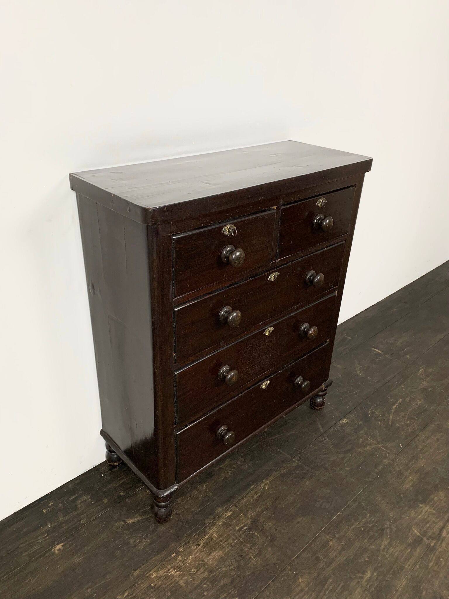 Dark antique chest of drawers