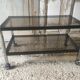 Metal coffee table with smoked glass.