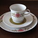 4 cups and dessert plates with vintage flower