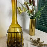 Glass carafe encased in wrought iron