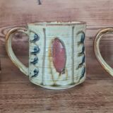 Glazed stoneware mugs from the 60s