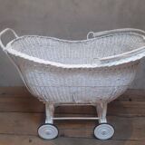 Wicker and painted wood baby cradle
