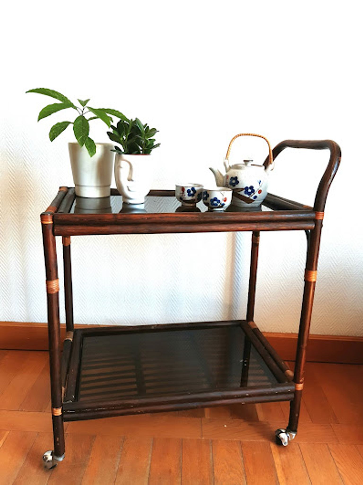 Rattan and smoked glass rolling service