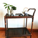 Rattan and smoked glass rolling service