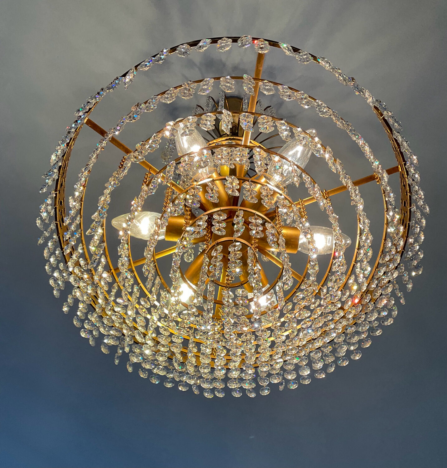 Cascade chandelier with crystal and bronze tassels