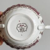 Porcelain cup with two handles