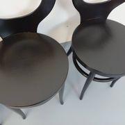 Set of 4 vintage Mouette chairs by Baumann in black wood from the 1960s.