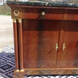 Flamed mahogany enfilade with sea green marble in Empire style.