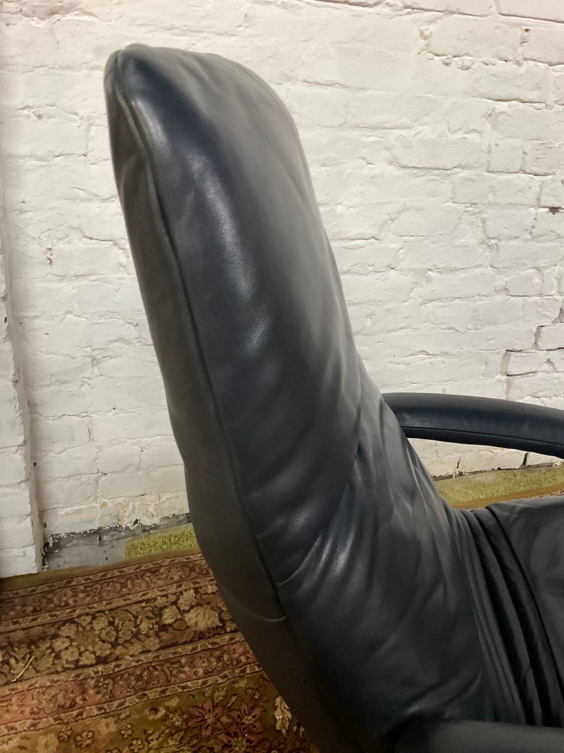 Jori black leather relax armchair from the 80s