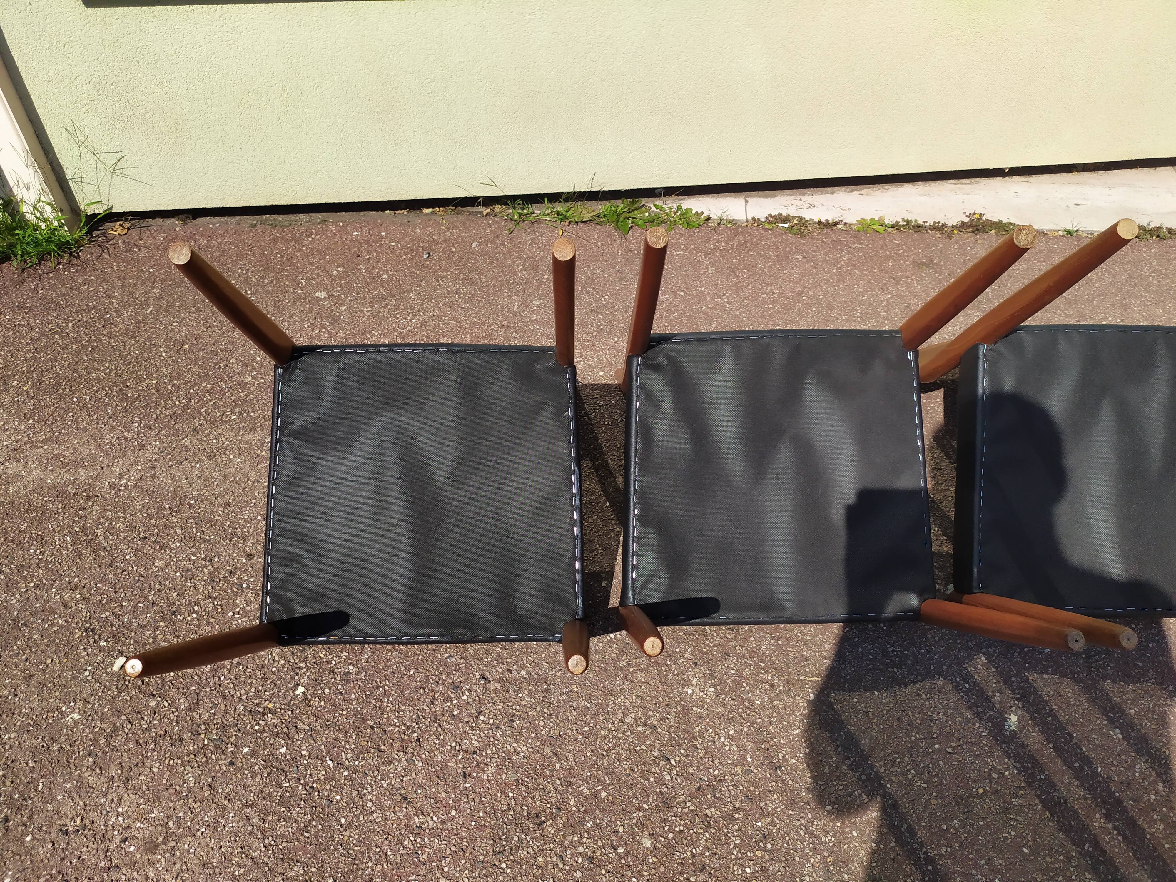 Set of 4 Scandinavian teak chairs in black leather