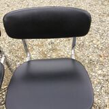 6 vintage chairs in black skaï with chrome metal tubular base.