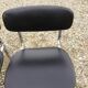6 vintage chairs in black skaï with chrome metal tubular base.