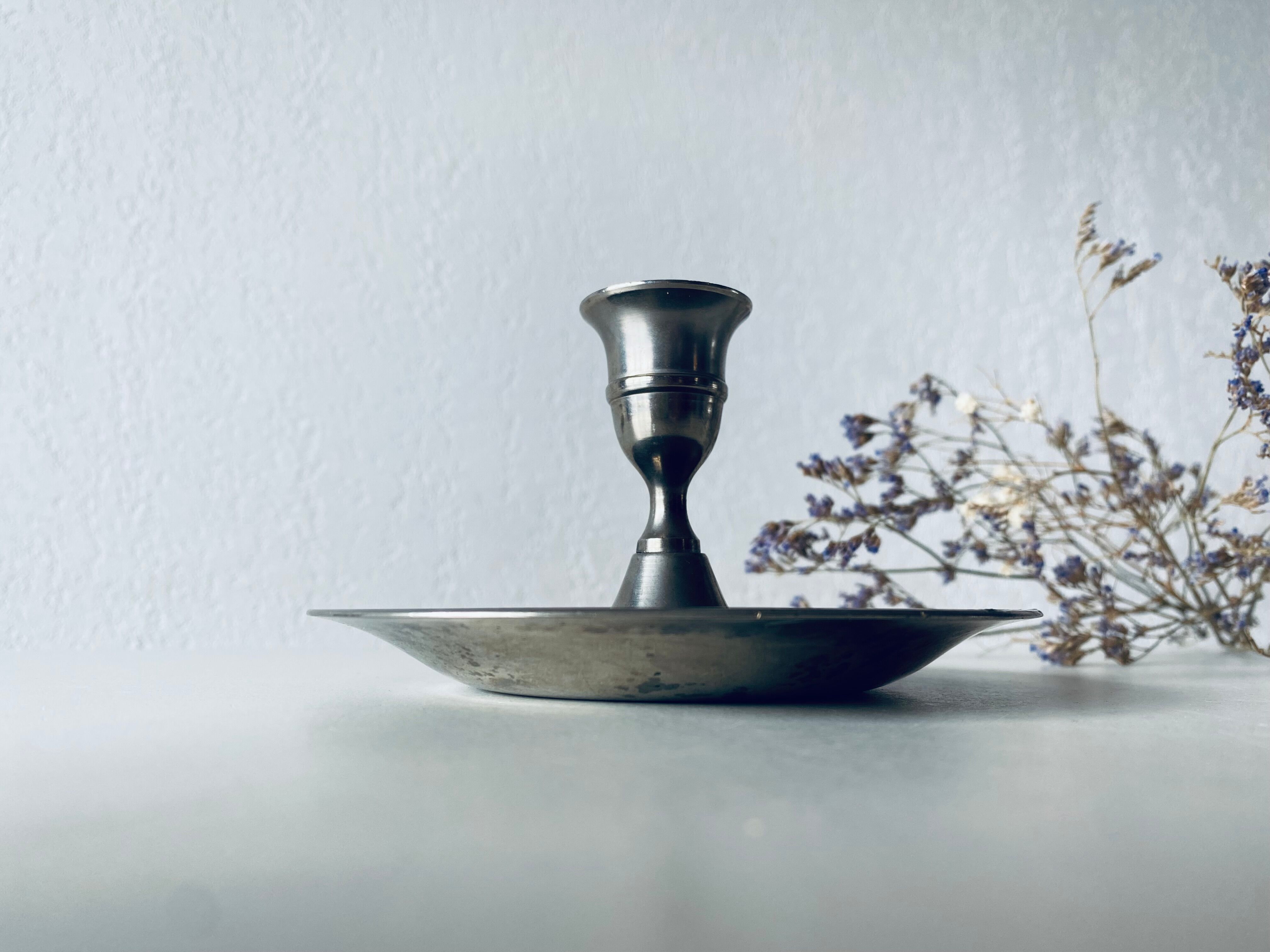 Old silver candle holder