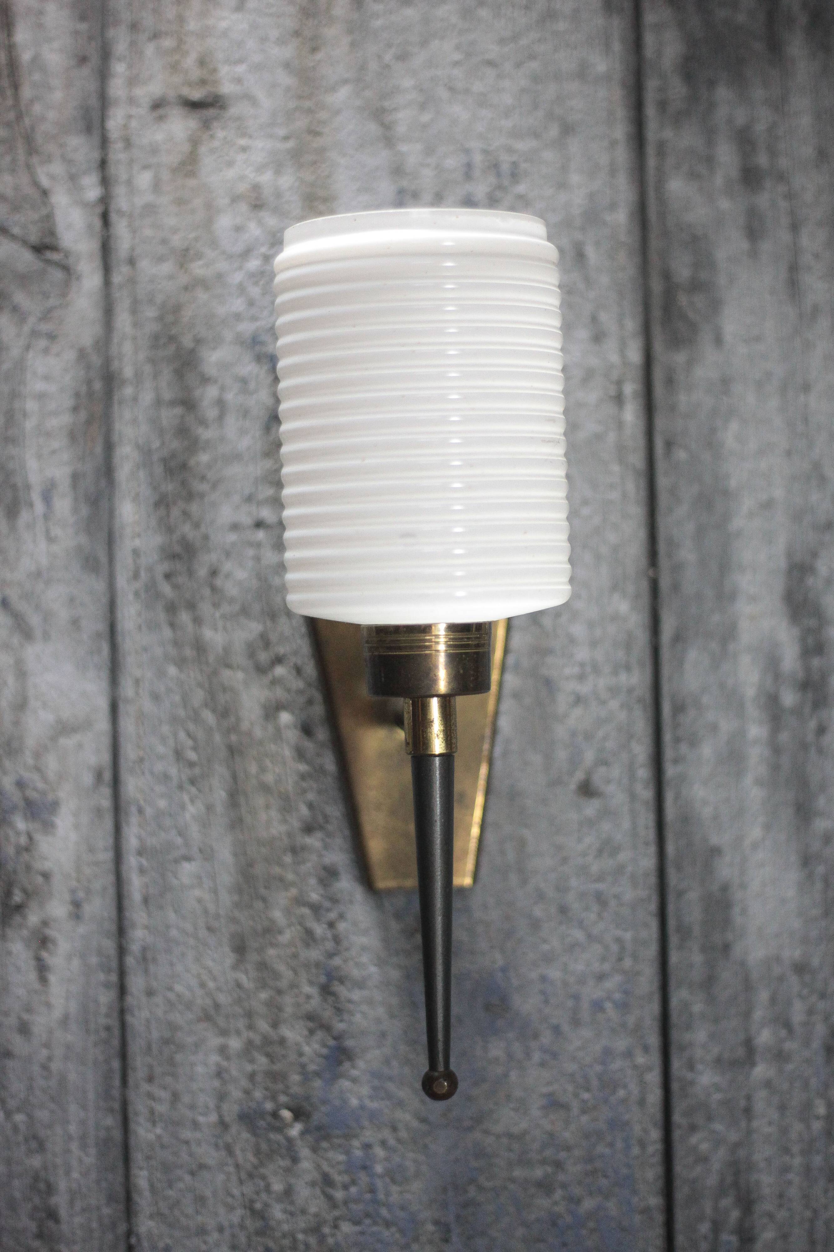 Brass wall light, black lacquered metal and white opal glass, 50s.