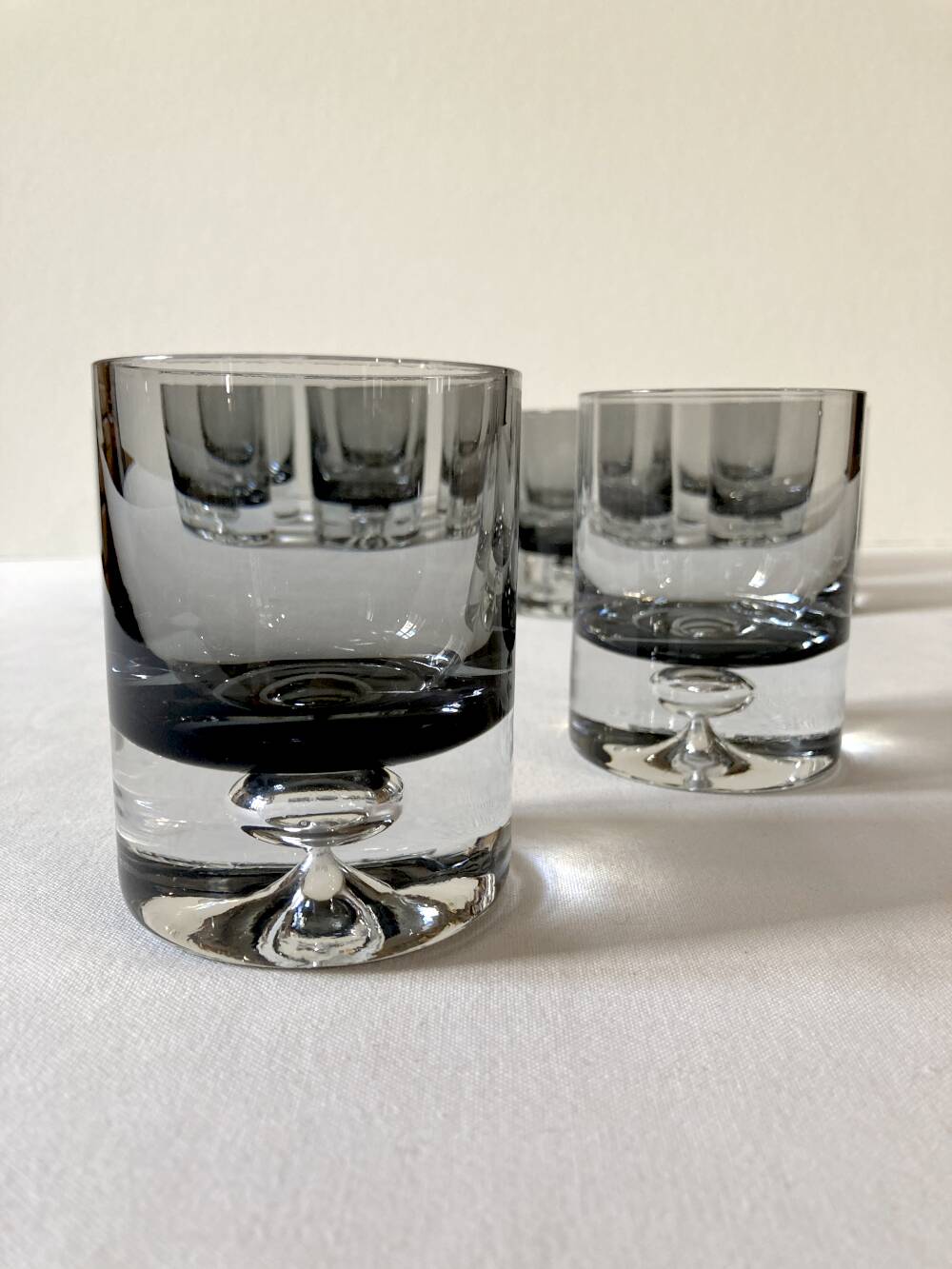 10 smoked glass aperitif glasses, 1960s-1970s