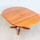 1970s solid teak dining table with Scandinavian design.