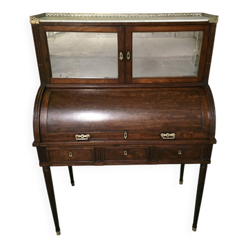 Cylinder desk in mahogany and mahogany veneer, Louis XVI style, 19th century.