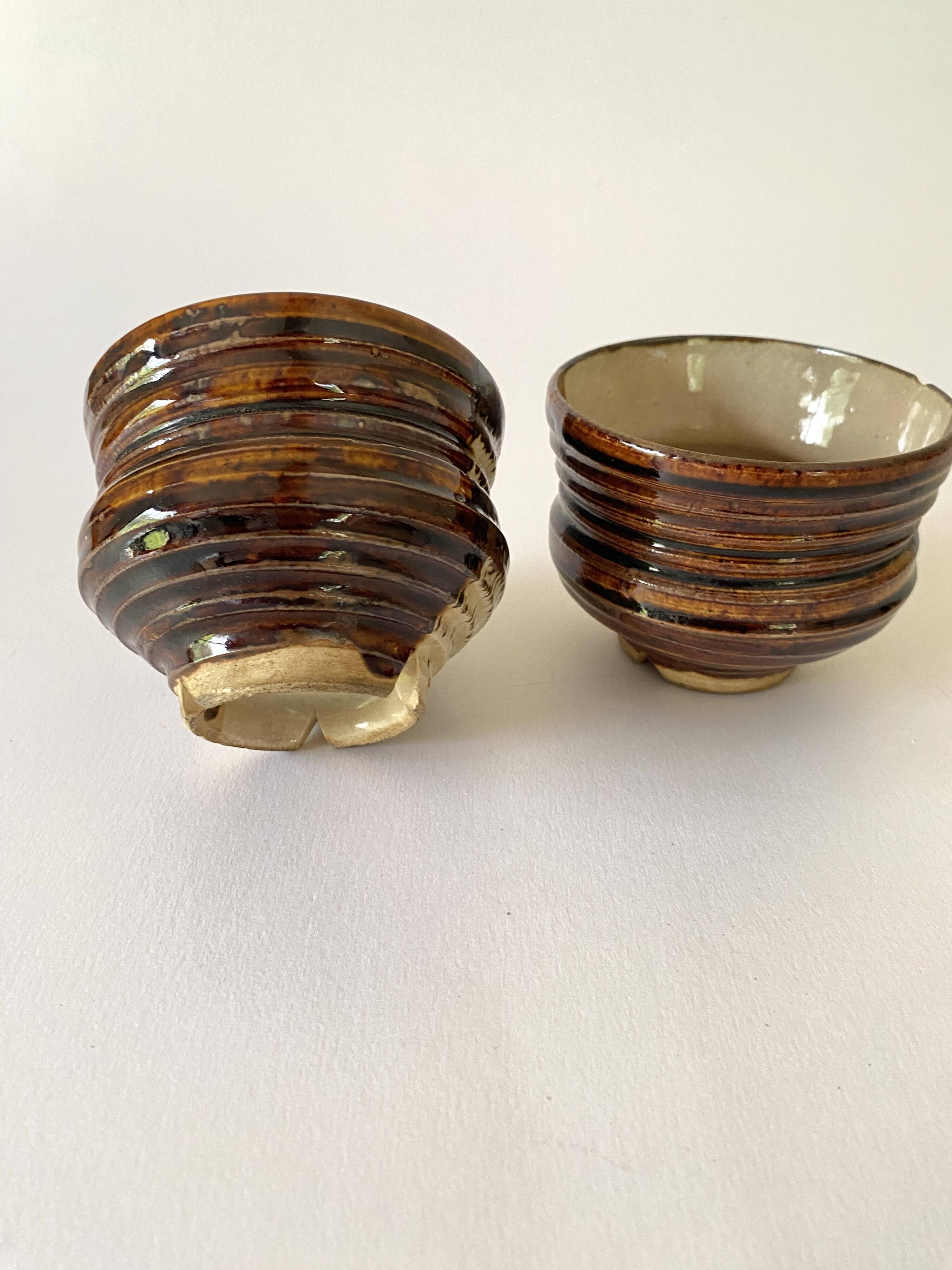 Duo of enamelled earthenware pots, Tunisia