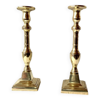 Pair of old brass candlesticks