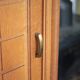 Vintage wooden wardrobe with sliding doors