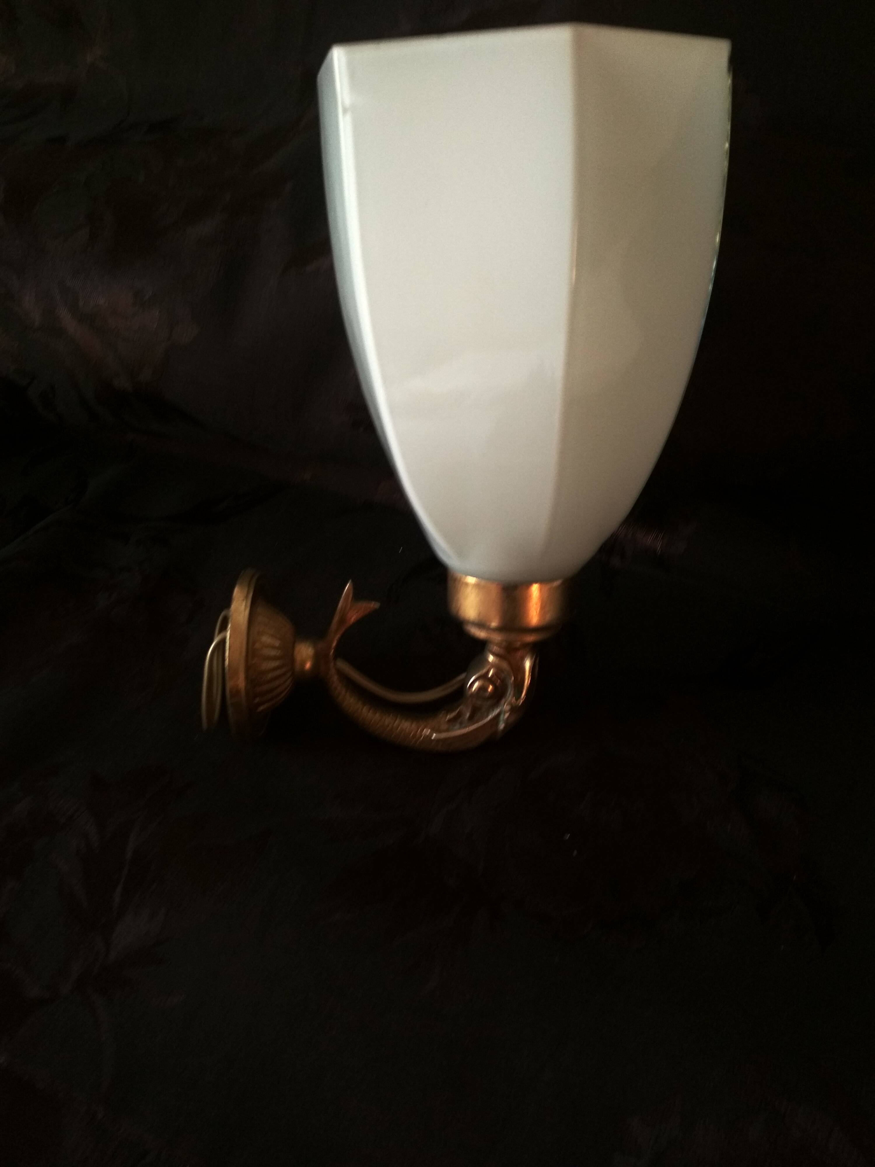Golden brass wall light with glass tulip - dolphin pattern bathroom lamp