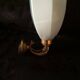 Golden brass wall light with glass tulip - dolphin pattern bathroom lamp