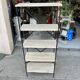 Industrial-style shelf in light wood and cast iron
