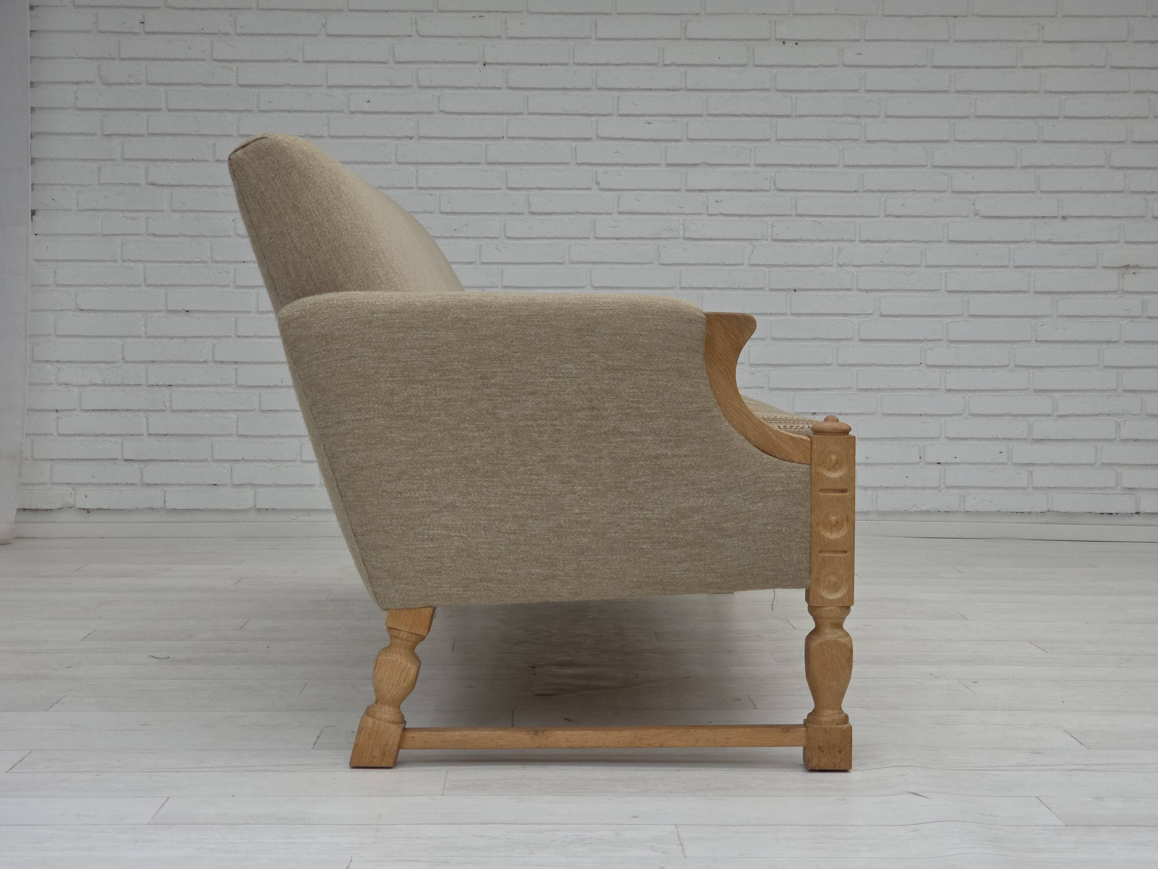 1970s, 3-seater Danish sofa, original beige furniture wool, solid oak wood.