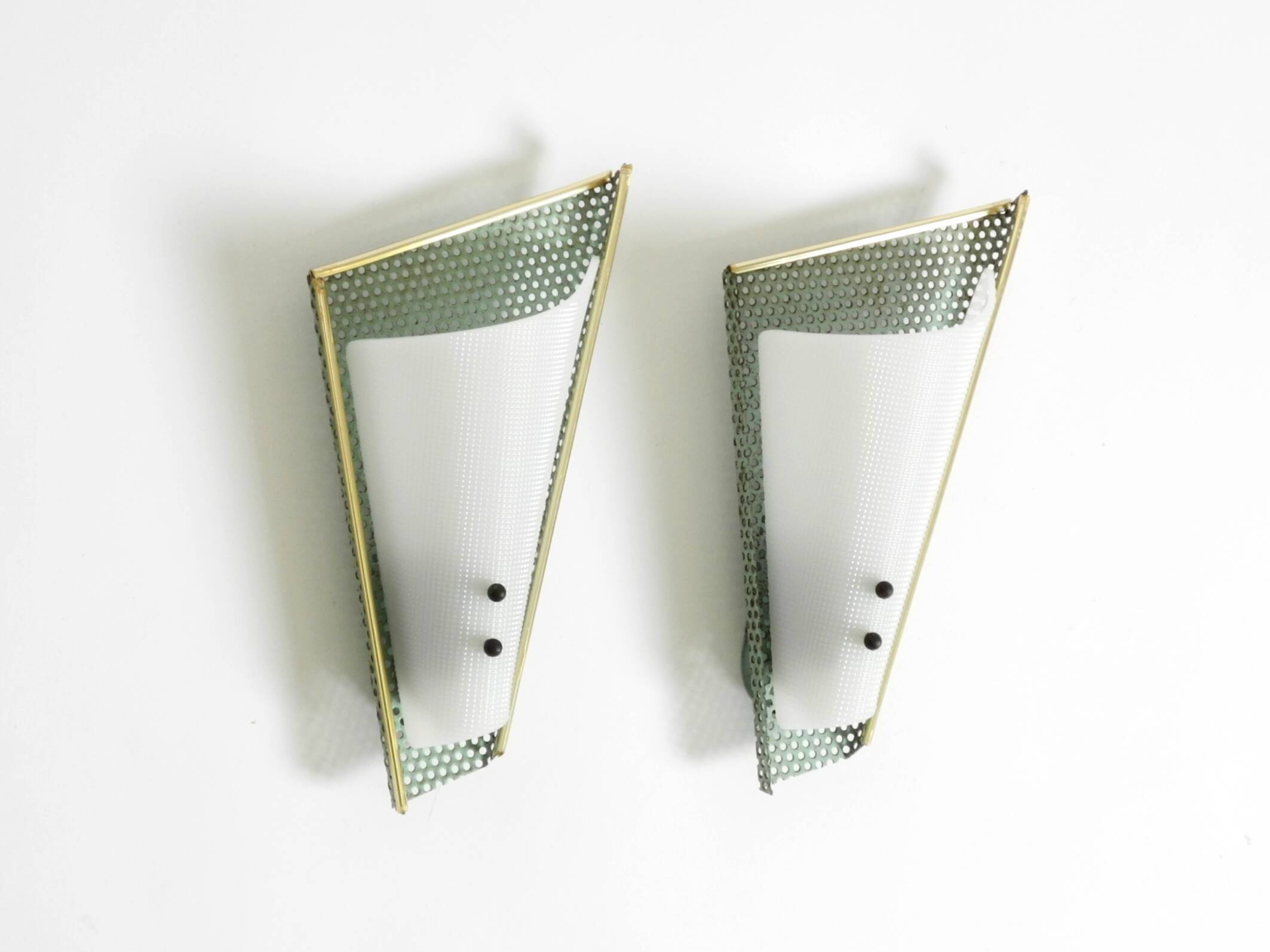 Pair of beautiful mint green Mid Century Modern perforated sheet metal wall