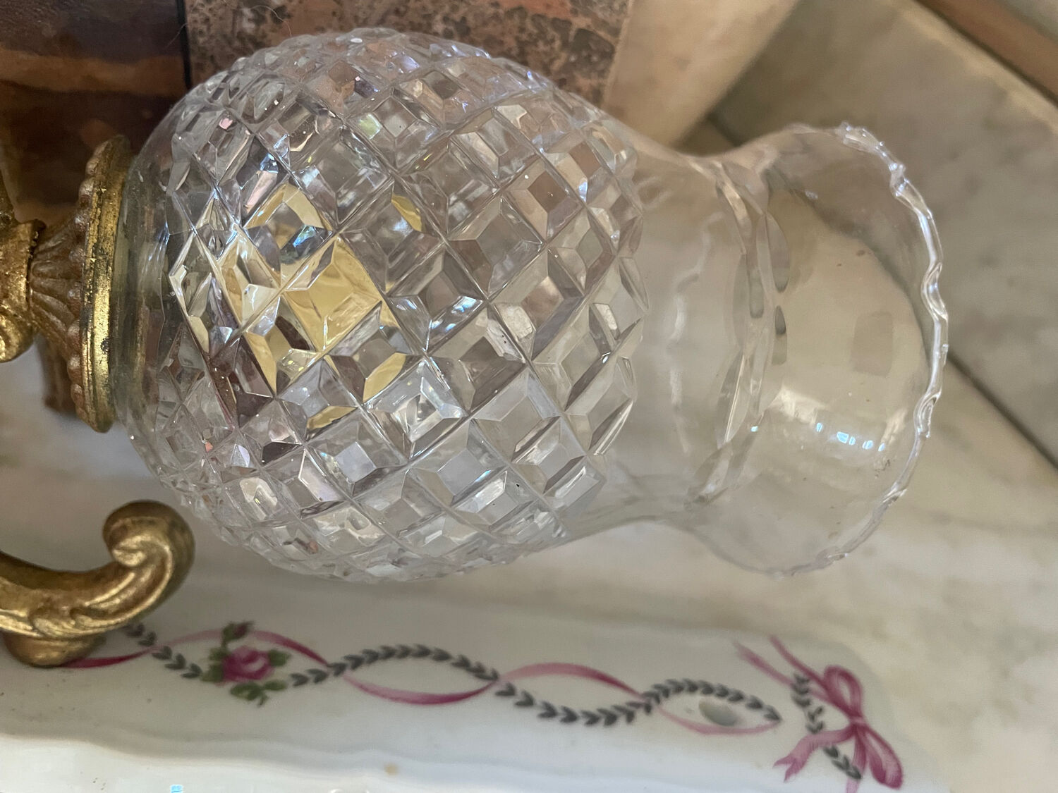 Pair of cut glass and Limoges porcelain wall sconces