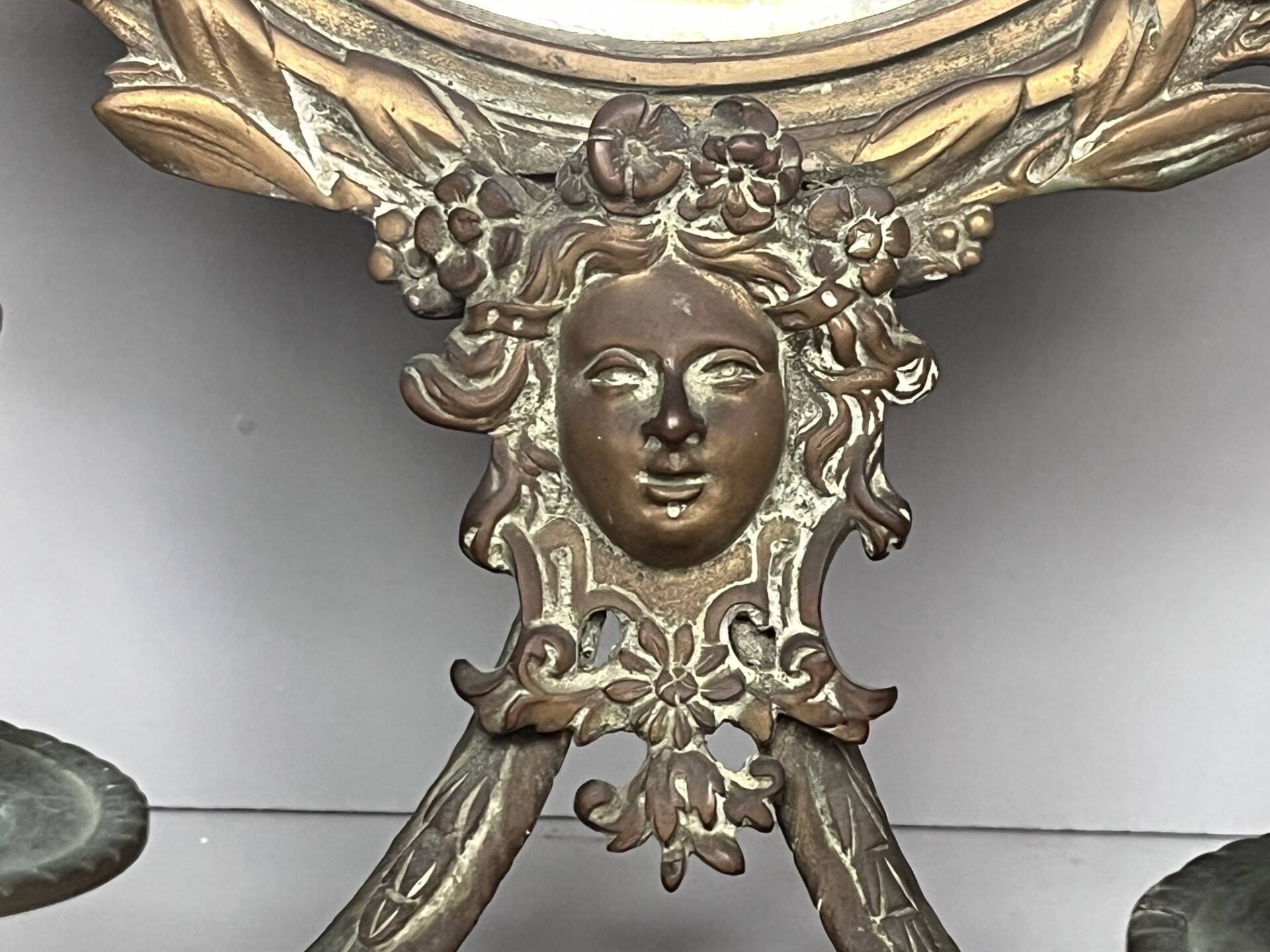 Pair of mirror sconces with bronze candlesticks from the 19th century.