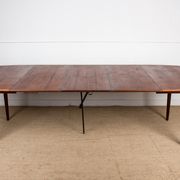 Expandable square teak dining table by Henry Walter Klein 1960