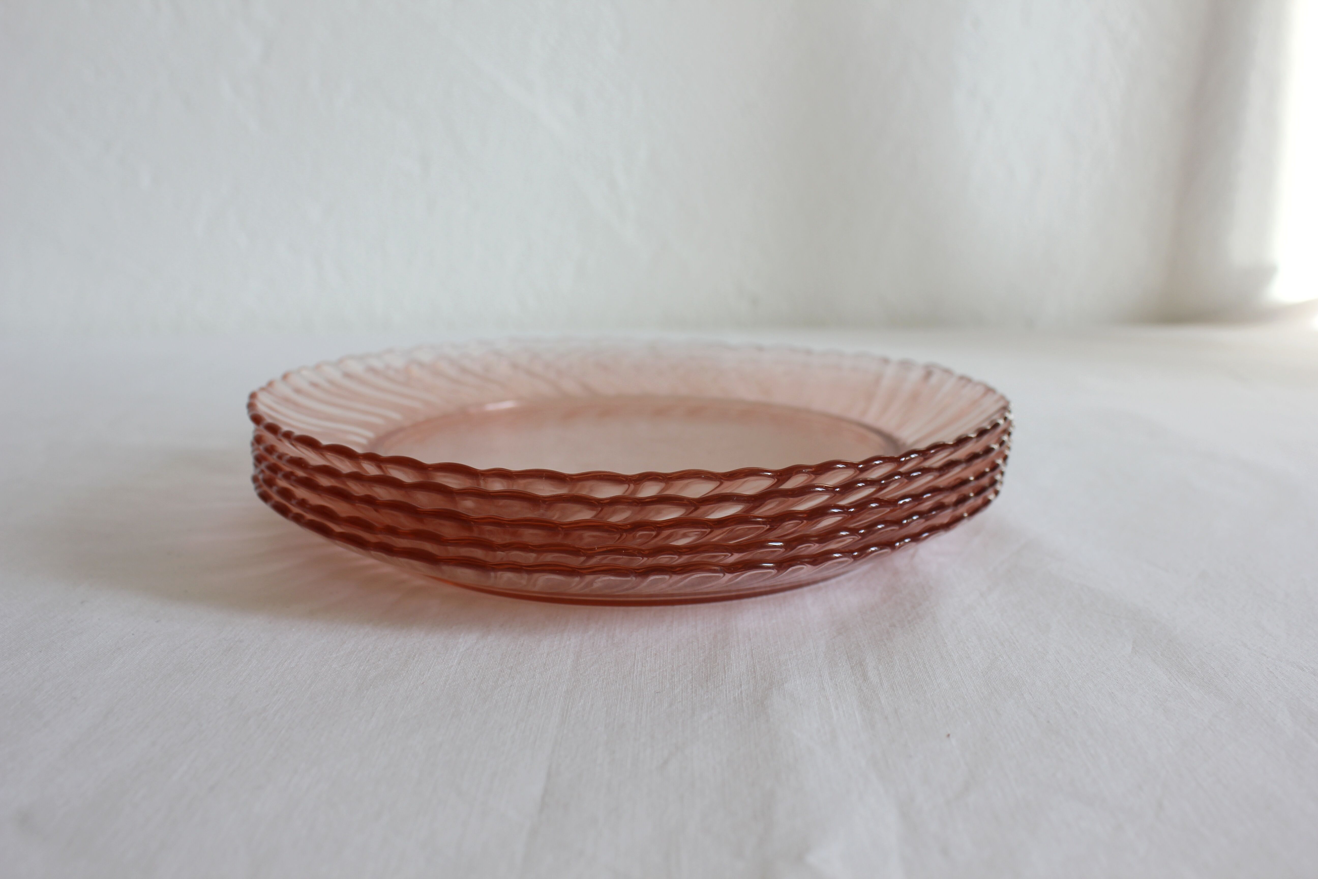 5 vintage Rosaline dessert plates in pink glass
