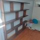 Asymmetrical wall or divider bookcase in dark wood