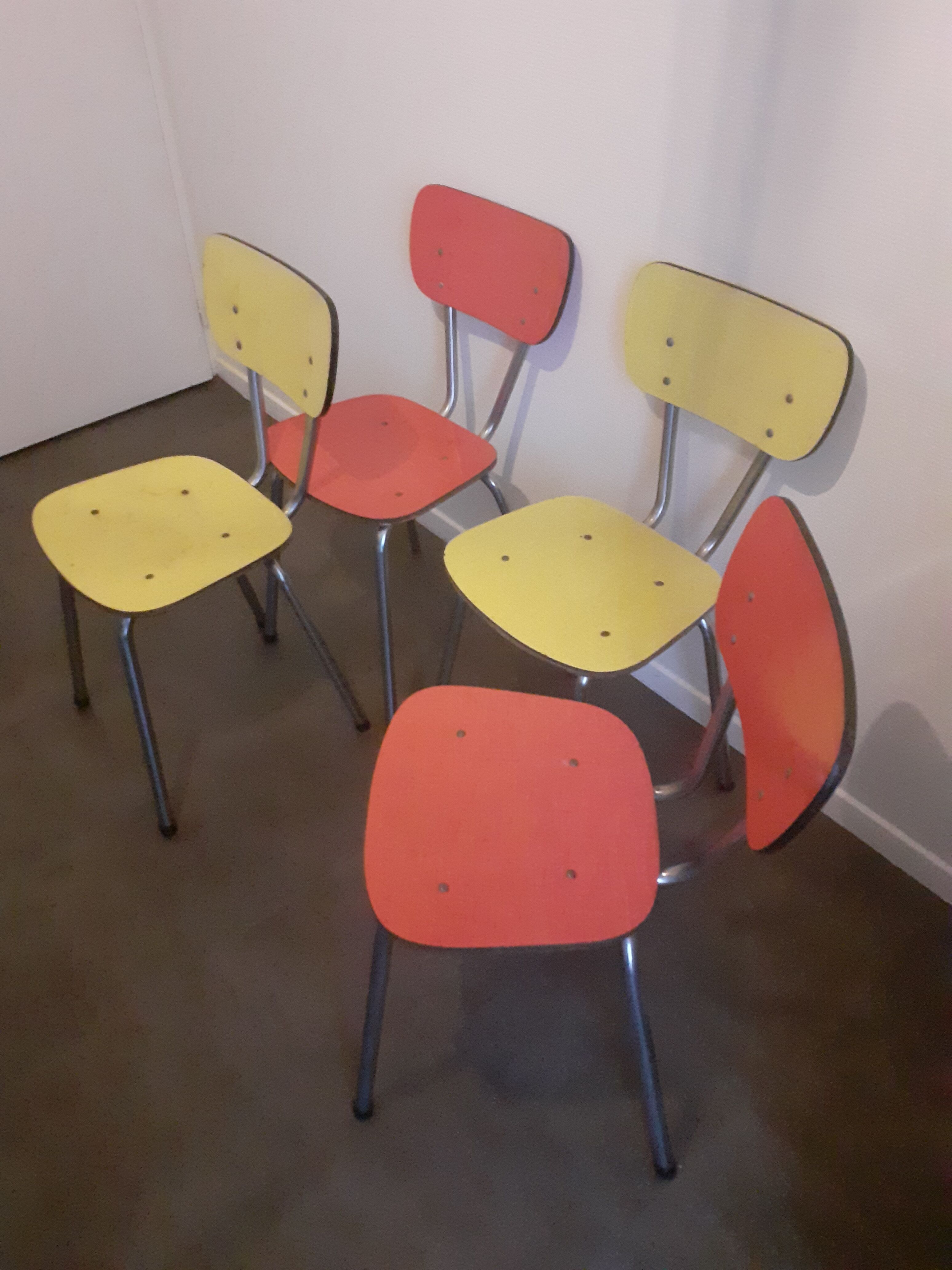 Set of 4 yellow and red formica chairs