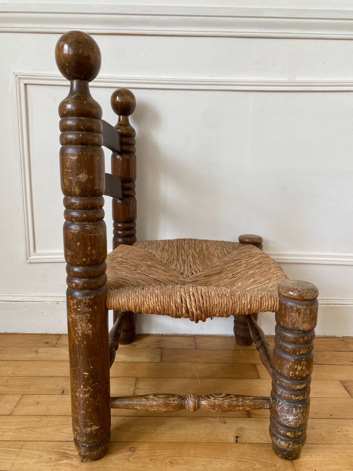 Low fireplace chair in the style of Charles Dudouyt