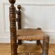 Low fireplace chair in the style of Charles Dudouyt