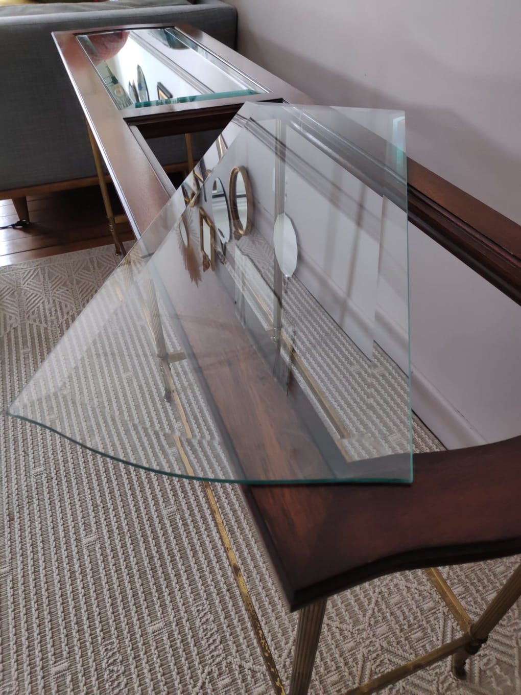 Glass and brass console table