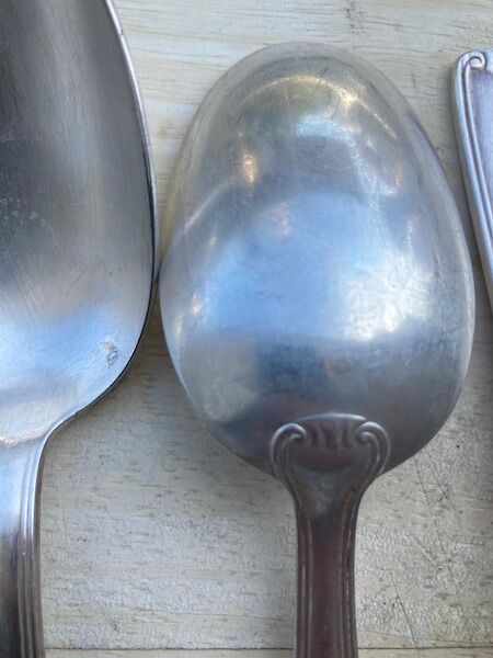 11 cuillères à soupe en métal argenté