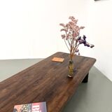 Modernist coffee table in solid elm, cylindrical pine base, 1970s.