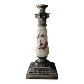 Silver-plated metal and porcelain candlestick