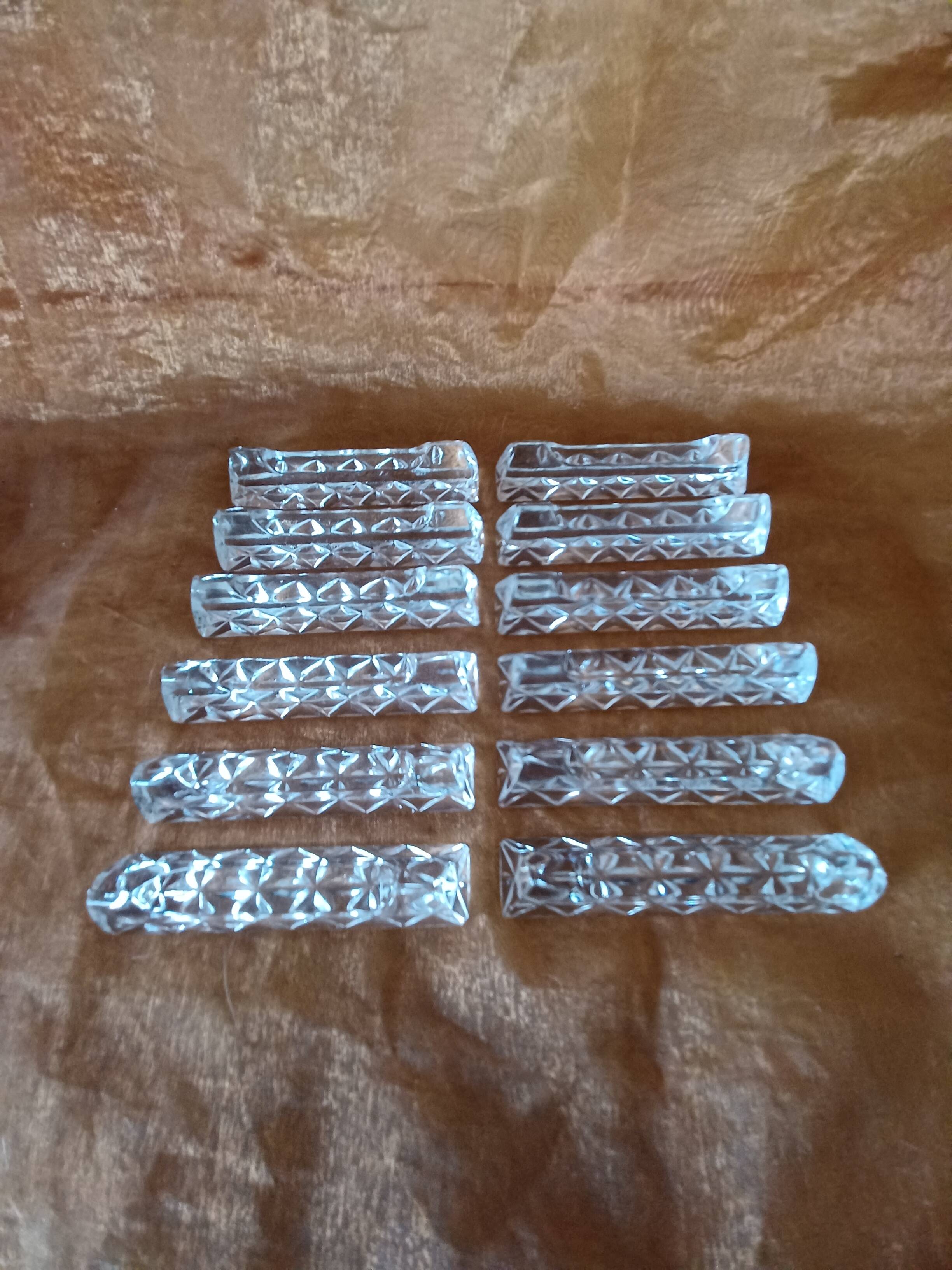 12 cut crystal knife holders.