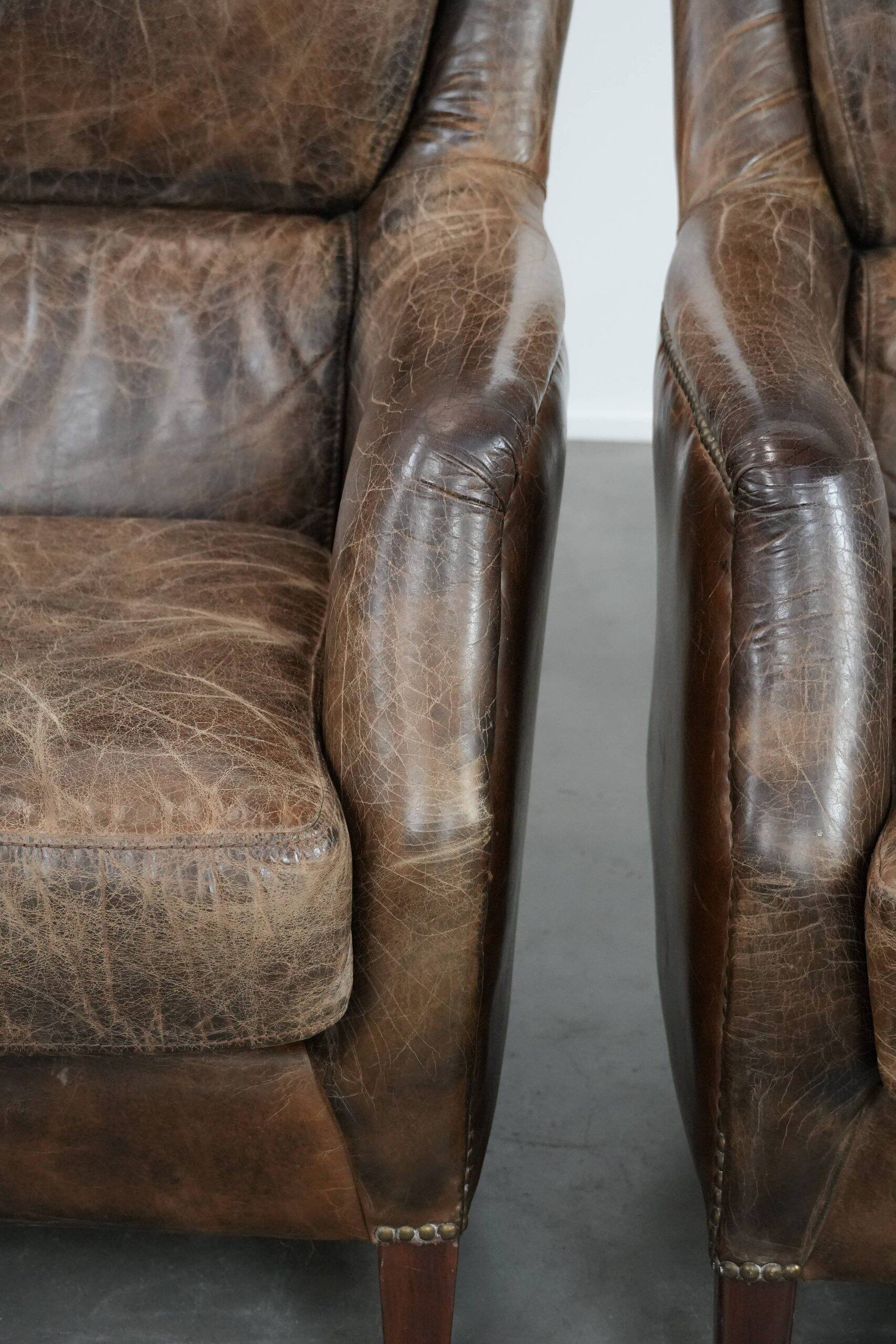 Very comfortable set of two vintage cowhide leather armchairs